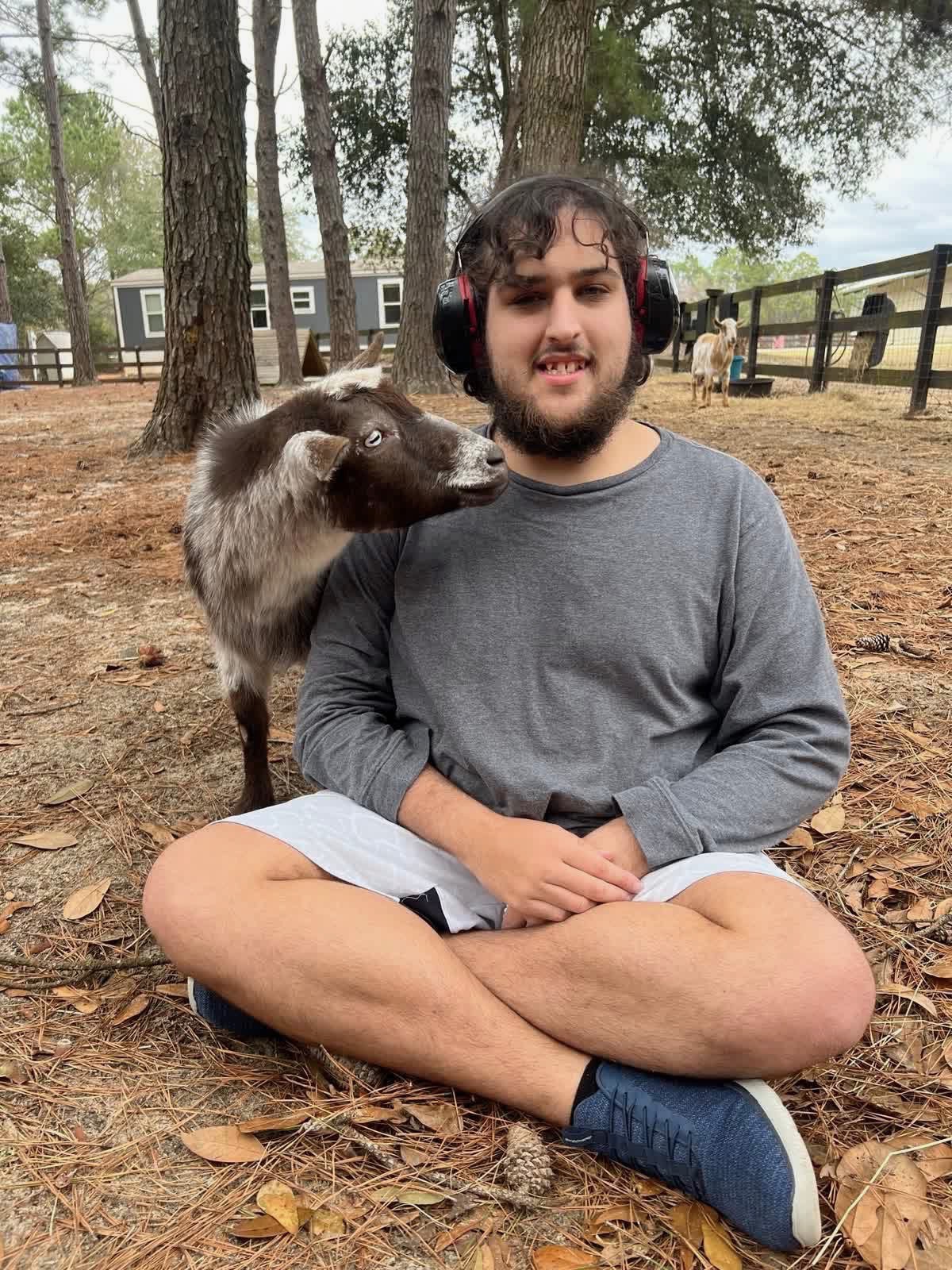 Todd's son with a goat